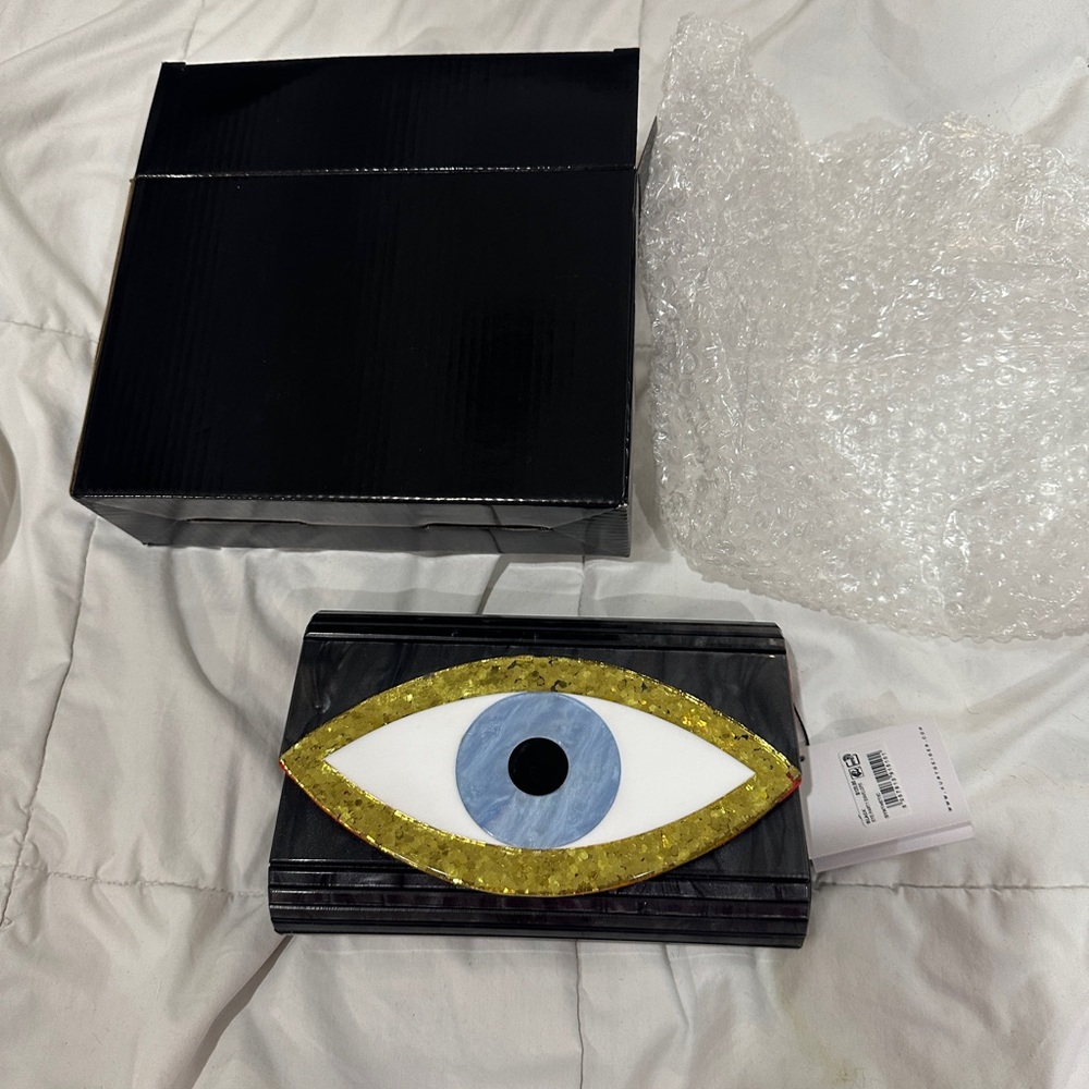 Kurt Geiger Black and Gold Eye Clutch